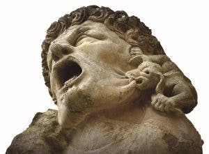 Gárgula representado demônio mordendo o rosto de um condenado. Catedral de Salisbury, Inglaterra.