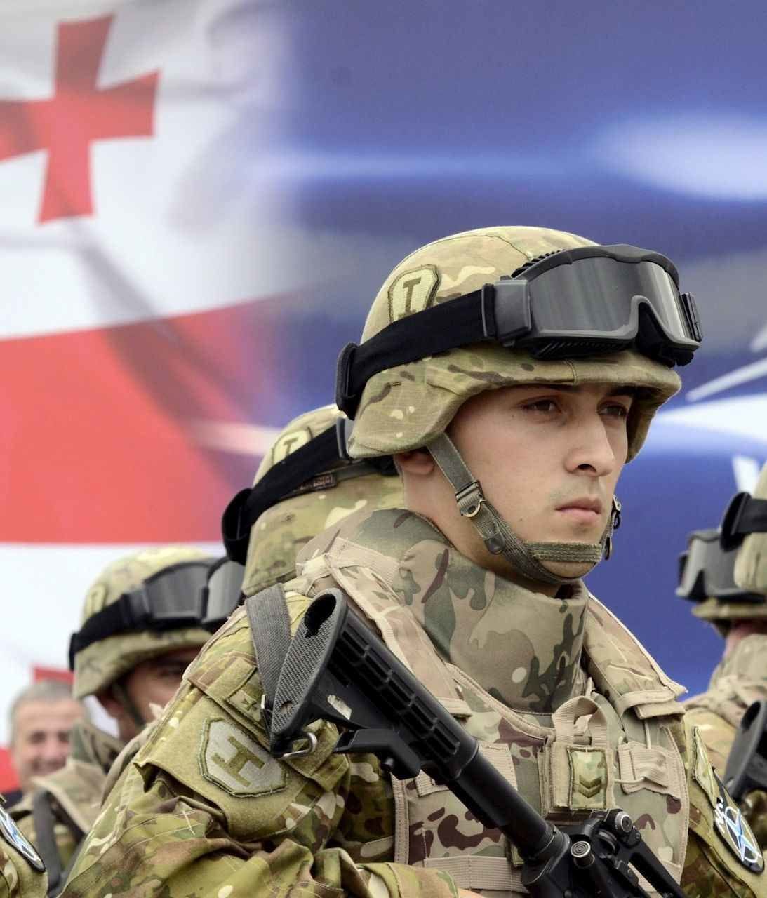 Georgian servicemen stand in formation during an opening ceremony of the Georgia-NATO joint training and evaluation center at the Krtsanisi settlement outside Tbilisi, Georgia, August 27, 2015. NATO said a new training center opened in Georgia on Thursday would help the former Soviet republic to move closer to membership in the military alliance, a prospect sharply opposed by neighboring Russia. REUTERS/Irakli Gedenidze