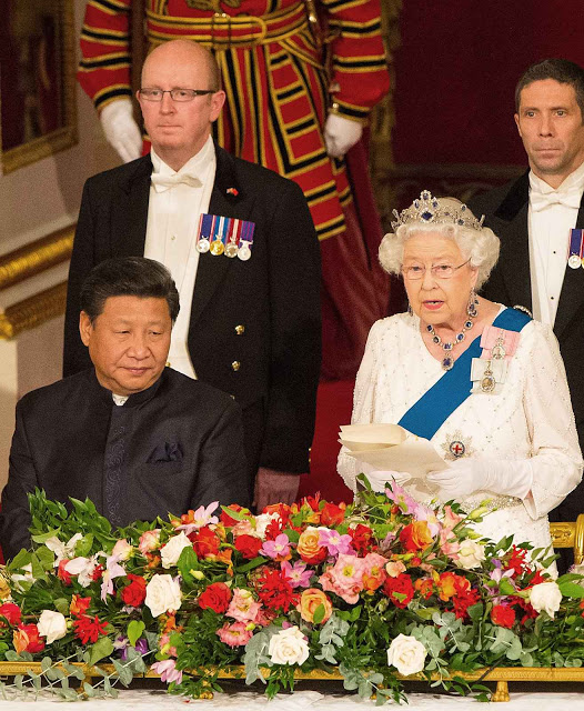 The Duchess of Cambridge and Chinese President Xi Jinping listen as Britain's Queen Elizabeth II speaks at a state banquet in the Ballroom at Buckingham Palace, London, on the first day of the state visit to the Britain, Tuesday Oct. 20, 2015. (Dominic Lipinski/Pool Photo via AP)